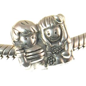 Retired Chamilia brother sister charm